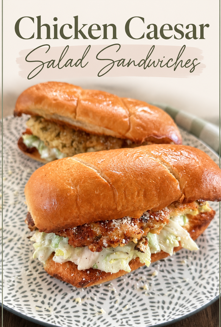 Crispy chicken Caesar salad sandwiches made with golden breaded chicken, creamy Caesar salad, crisp lettuce, and Parmesan cheese served on toasted sandwich rolls.