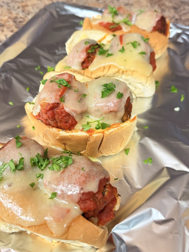 Turkey meatball sub with homemade turkey meatballs, marinara sauce, and melted cheese on a toasted sub roll